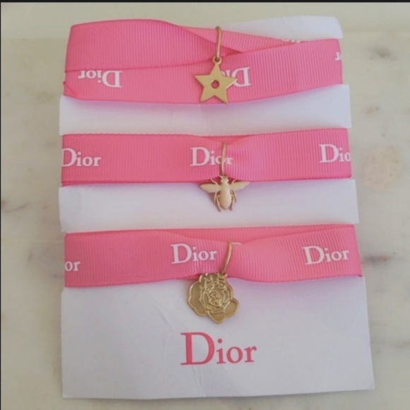 Last one available New never used DIOR gold Charm & pink Ribbon Bracelet STAR🌟 - Picture 1 of 4